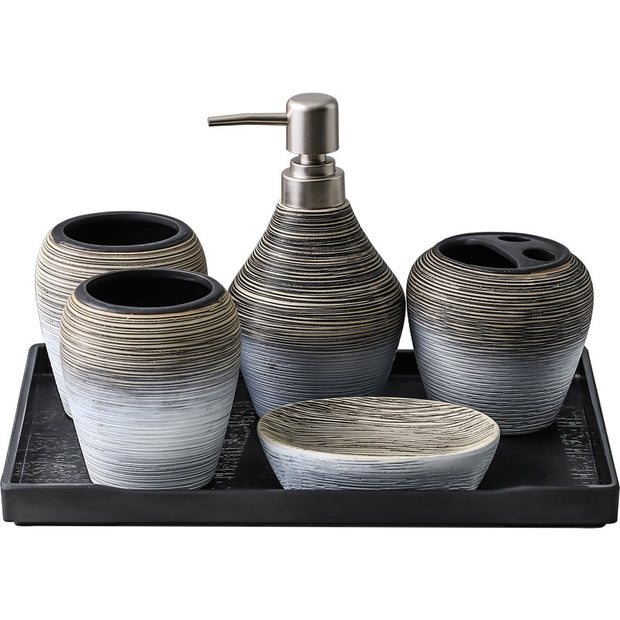 Retro brushed bathroom wash set including five ceramic pieces on a tray, featuring a soap dispenser and holders.